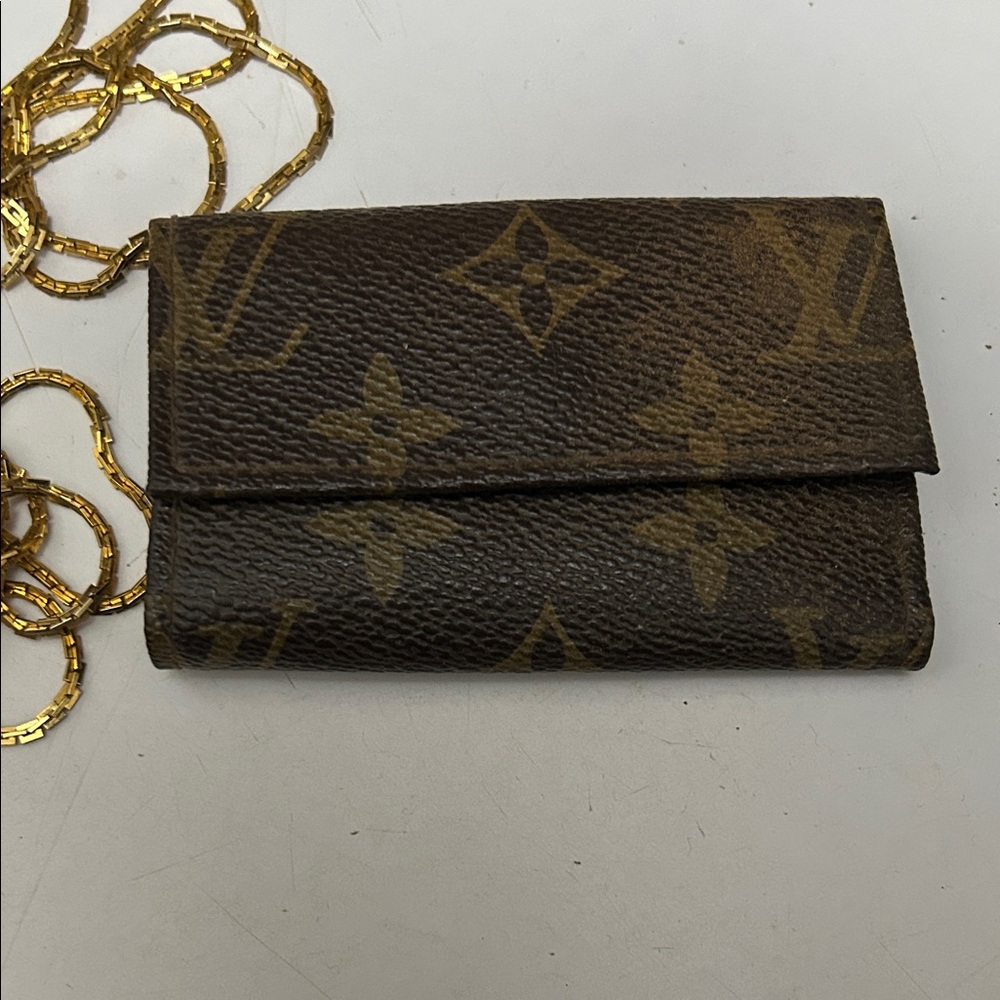 Louis Vuitton vintage and loved key case.
